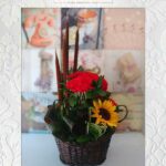 canasta floral en rosas y girasoles