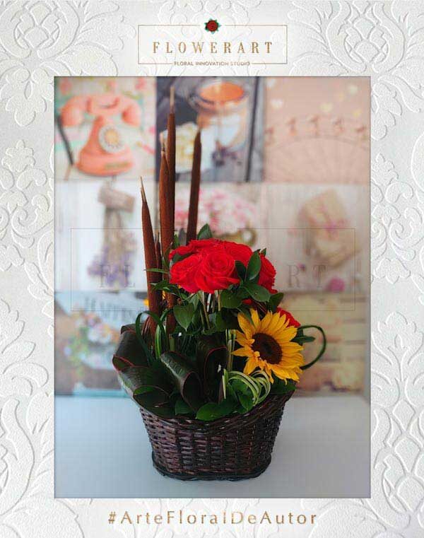 canasta floral en rosas y girasoles